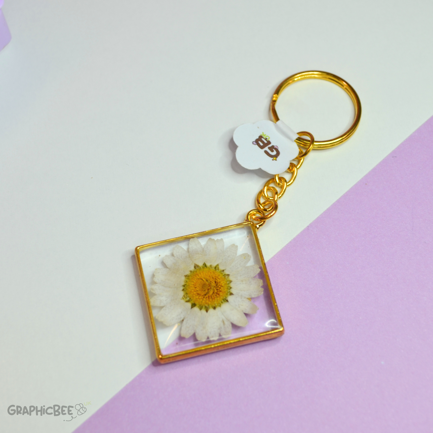White Daisy Diamond Shaped Bezel Resin Keyring