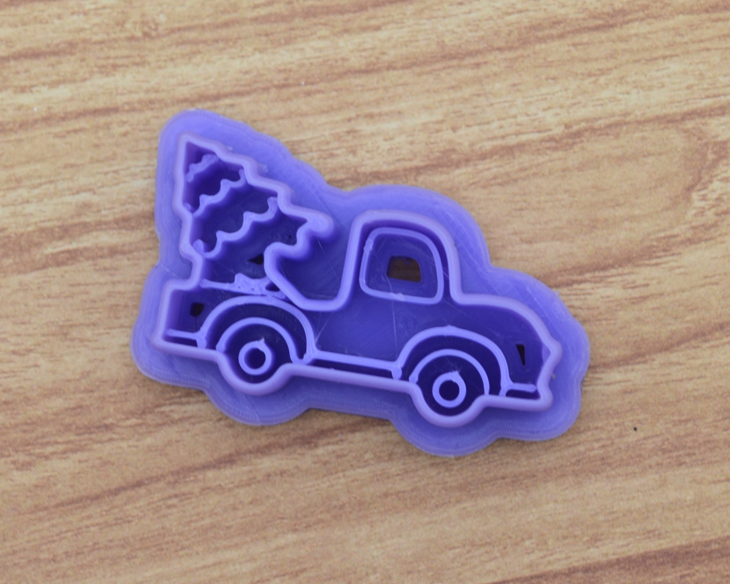 Truck Hauling Tree Clay Cutter